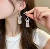 Pendientes japoneses y coreanos dulces populares, frescos y elegantes, lujo ligero, modernos y con estilo, pendientes versátiles para el uso diario de mujer, al por mayor