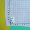 Coelho Fofo Sentado de Desenho Animado Usando Cachecol Resina DIY Capa de Celular Elástico de Cabelo Acessório de Cabelo Fivela de Sapato Material Acessórios Atacado