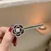 Versión coreana de horquilla de camelia de diamantes blancos y negros completa estilo pequeño fragante clip para flequillo clip de una palabra clip de pico de pato clip lateral dulces accesorios para el cabello