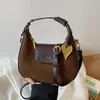 Bolso Maillard de alta gama, estilo nicho, para mujer, nueva colección otoño 2026, bolso de hombro retro para el día a día, bolso cruzado en forma de media luna