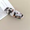 Pinza para el cabello popular de acetato transfronteriza con un toque de alta gama, pinza de resorte ovalada, pinza superior para la parte posterior de la cabeza, pinza para coleta, pasador