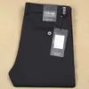 Pantalones de Vestir de Negocios Otoño e Invierno 2024 Nylon Alta Elasticidad Rectos Ajustados No Planchar Anti-arrugas Lujo Casual para Hombre