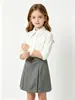 Traje de Color Sólido para Niñas Primavera y Verano, Falda Corta, Falda Plisada de Cintura Alta, Falda de Uniforme Escolar para Estudiantes, Suministro Directo del Fabricante