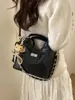 Bolso Cubo de Diseño Nicho Estilo Coreano para Mujer 2026 Modelo Nuevo de Primavera Gran Capacidad para Viajes y Commuting Moda Elegante Bolso Cruzado