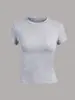 Camiseta Básica Estilo Kardashian Europea y Americana de Color Sólido con Cuello Redondo Elástica de Hombro Normal Manga Corta para Mujer, Top Delgado de Verano que Ceñe la Cintura
