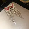 Brincos Europeus e Americanos Transfronteiriços de Agulha Prateada com Pingente de Zircônia em Forma de Coração, Brincos de Luxo Leve de Alta Qualidade, Brincos Versáteis da Moda de Nicho para Mulheres