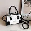 Bolso tipo almohada de mano de alta gama a la moda 2026 otoño transfronterizo nuevo bolso de hombro casual simple bolso cruzado de moda para el día a día