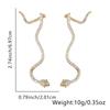Pendientes calientes transfronterizos del distrito de Lu, chapados en cobre color oro real, pendientes de animal serpiente de personalidad, ventas directas de fábrica al por mayor