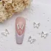 Acessórios de nail art de celebridade da internet borboleta de metal oca super brilhante borboleta dourada e prateada liga de metal decoração de unha de fada