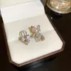 Brincos de Coração de Urso com Zircônia e Agulha de Prata 925 Brincos Assimétricos de Alto Padrão Moda Versátil para Roupas de Trabalho Doces