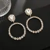 Brincos longos de círculo de strass quente transfronteiriços simples com diamantes cheios temperamento de noiva brincos exagerados fabricantes atacado E831