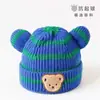 Bebé Otoño e Invierno Estilo Coreano Sombreros de Punto para Niños y Niñas Bebé Rayas Cabeza de Oso Lana Sombrero Borde Enrollado Melón Piel Sombrero Cálido