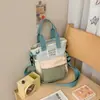 Nueva Bolsa Cruzada de Hombro Única Deportiva para Viajes Infantiles Ligera Portátil de Colorido Bloqueo Tendencia Estilo Coreano Diseño para Exteriores