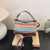 Bolso Tejido de Paja con Rayas Arcoíris para Mujer 2026 Nuevo Bolso de Playa Tejido Bolso de Mano de Nicho para el Trabajo Bolso Cruzado