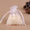 Bolsa de hilo para joyería al por mayor de fábrica color liso hilo de perla bolsa para dulces de boda empaque de joyería color liso bolsa de malla de gasa organza