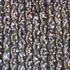 Tela bordada con lentejuelas primavera y verano nuevo red elástica bordado plano ropa de escenario moda para mujer vestido en stock suministro