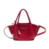 Bolso de mano de diseño de moda transfronterizo con alas, nuevo bolso tipo cubo de nicho de moda, versión coreana versátil para hombro y bandolera para mujer