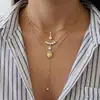 Collar con Forma de Y Estilo Resort Europeo y Americano, Acero Inoxidable Chapado en Oro de 18 Quilates, Moderna Cadena para Clavícula con Borla de Circonita y Perla
