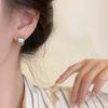 Pendientes retro clásicos de metal europeos y americanos para mujer, pendientes de estilo socialité con diseño de viento frío, joyería de oído de alta calidad al por mayor