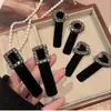 Presilha de Cabelo Bb de Veludo Preto com Strass, Elegante e Versátil para Mulheres
