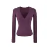 Estilo minimalista europeo y americano, tejido de alta elasticidad y resistente a las arrugas, cintura ajustada, longitud corta, escote en V pronunciado, camiseta de manga larga como capa base, top interior ajustado para mujer