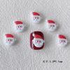 Venta al por mayor Serie navideña adornos para uñas estéreo esmerilado Papá Noel dibujos animados alce muñeco de nieve resina DIY Uñas