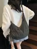 Bolso de Cuadros Versátil Tipo Dumpling de Otoño e Invierno Dongdaemun Corea del Sur 2025 Nuevo Moda Ligero para Viajes Diarios con Cierre de Cordón Cruzado