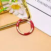 Cierre de resorte vibrante con forma de dona pintada, llavero de aleación de zinc, accesorio para joyería DIY, anillo abierto de conexión, venta al por mayor