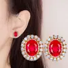 Aretes de botón de tesoro de color diamante completo de venta caliente en vivo, aretes de botón de rubí natural de imitación ovalado de 6 quilates con incrustaciones de alta calidad, anillo