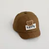 Boné de pico outono e inverno para bebê urso fofo moda coreana à prova de vento veludo cotelê boné de beisebol aba curta atacado