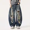 Jeans de mezclilla lavados y desgastados de moda estilo americano con tinte salpicado y detalles rasgados, pantalones largos de pierna ancha para hombre, nueva colección otoño 2026