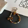 Correa para Teléfono con Lazo y Cuentas Estampado de Leopardo Otoño e Invierno Colgante para Llaves de Coche Accesorio Colgante para Estuche de AirPods