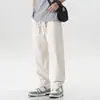 Pantalones de hombre color blanco roto, corte recto holgado, modernos y versátiles, pantalones casuales finos y transpirables para verano, diseño cónico elástico, talla grande