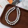 Comercio Exterior Dulce y Fresco Pequeña Fragancia Lujo Ligero Perla Artificial Corazón Cadena Doble Lanyard para Teléfono Móvil Colgante de Bolsa Colgante para Llavero