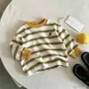 Nueva colección de primavera de camisetas de manga larga para niños, nueva colección de otoño 2026 de tops a rayas estilo coreano para niños, perfectos para la temporada de regreso a clases