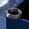 Amazon Acero de Titanio Moda de Alta Gama Anillos Giratorios para Hombres y Mujeres Europeos y Americanos Huellas de Colores Populares Anillos de Pareja Venta al por Mayor
