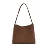 Bolsa de cubo tejida de nicho coreano Otoño 2026 Bolsa de hombro individual de gran capacidad Bolso de mano para axila elegante casual de alta estética