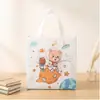 Bolsa de regalo de crecimiento infantil más vendida transfronteriza, bolsa de mano de tela no tejida con estampado de dibujos animados, bolsa para dulces de Halloween