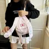 Mochila de Nuevo Estilo con Estrella de Cinco Puntas y Orejas Grandes de Conejo, Diseño de Nicho, Bolsa de Viaje Versátil, Mochila Rayada para Estudiante y Viajero