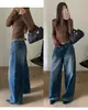 Novedades de otoño: TOP Jeans acampanados versátiles estilo europeo de Guangzhou Thirteen Lines con efecto desgastado estilo old money con cinturón 82606