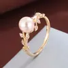 Anillo de Venta Caliente Transfronterizo Ramas y Hojas de Vid Exquisitas Europeas y Americanas con Perlas Rosas Encuentro Diamante Incrustado Arte Venta Directa de Fábrica
