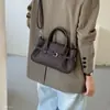 Bolso bandolera de un solo hombro simple para mujer, estilo nicho, lujo ligero, moderno, de mano, para ir al trabajo, coreano, nuevo modelo 2026