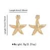 E13594 Brincos de estrela do mar e concha transfronteiriços europeus e americanos novos criativos moda estilo oceano brincos de textura de liga para mulheres