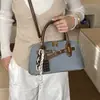 Bolsa de concha transfronteiriça para mulheres, nova de 2026 estilo coreano de verão, bolsa de mão versátil de nicho de alta qualidade, bolsa de ombro e transversal