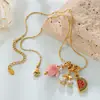Collar de cadena fina de hueso de serpiente dorada con colgante de lazo desmontable de perlas estilo retro de chica dulce transfronterizo europeo y americano
