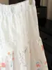 Falda Floral Calada con Bordado Pesado para Mujer 2026 Primavera y Otoño Nueva Casual Versátil de Línea A Acampanada de Longitud Media