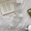 Calcetines finos de verano para mujer, estilo nicho ins universitario con lazo, hasta la mitad de la pantorrilla, calcetines de algodón calados de verano para mujer, estilo japonés, borde enrollado