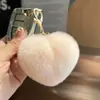 Lindo llavero de coche con forma de corazón de pelo de nutria, bola de felpa de moda, charm de mochila con forma de corazón, regalo