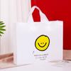Linda bolsa de tienda de ropa con cara sonriente, bolsa de regalo, tienda de ropa para niños y niñas, bolsa de plástico portátil, embalaje de caja de zapatos, logotipo al por mayor