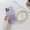 Funda de teléfono móvil degradado Traveler para Apple 15PROMAX comercio exterior 14/13 personalidad 12 cadena larga de cuentas 11